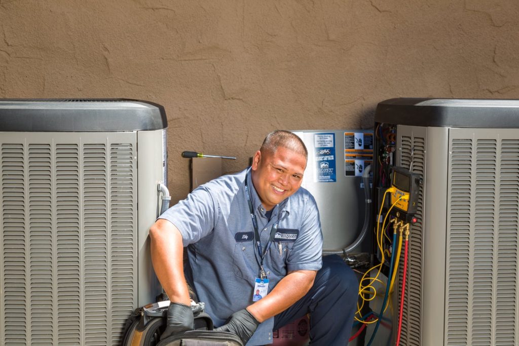 mauzy technician doing ac installation in san diego ca