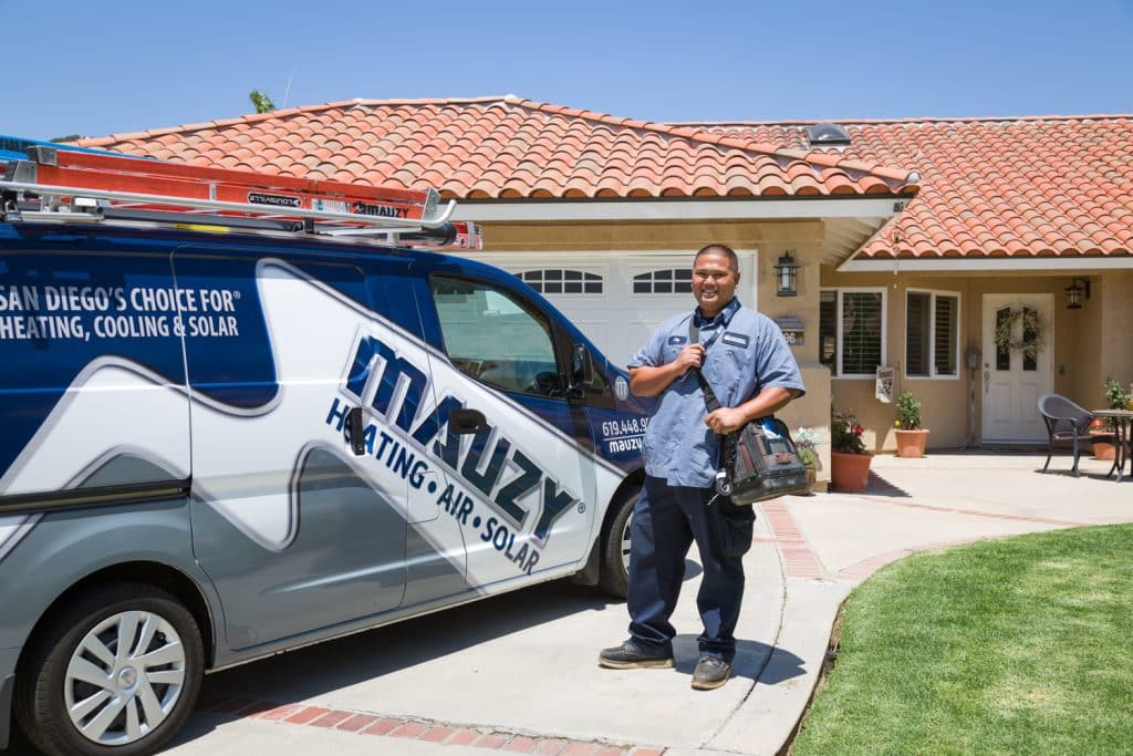 mauzy hvac technician on a service call in san diego