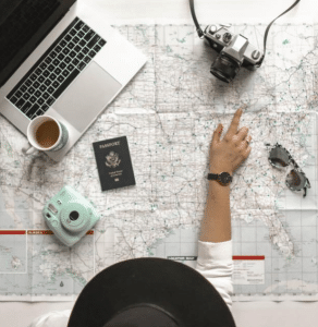 homeowner with a map planning a vacation