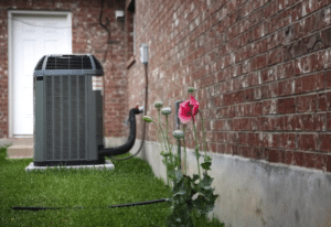 air conditioner in the backyard of a residential home