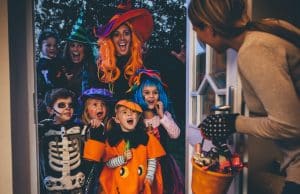 kids dressed up for halloween trick-or-treating
