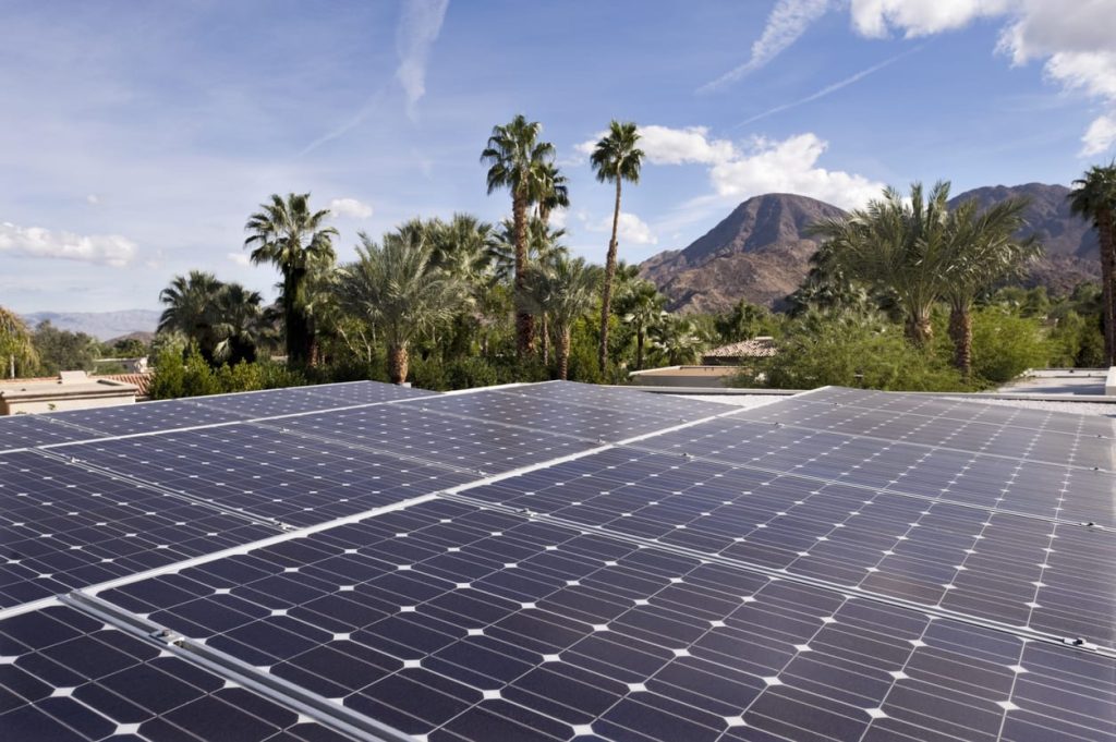 solar panel installation with mountains in the horizon