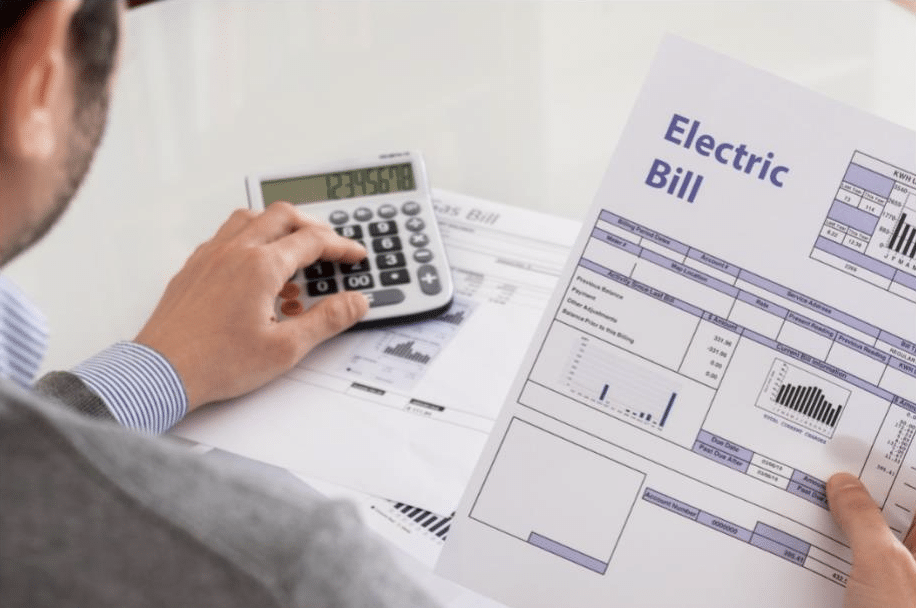 person calculating energy bill